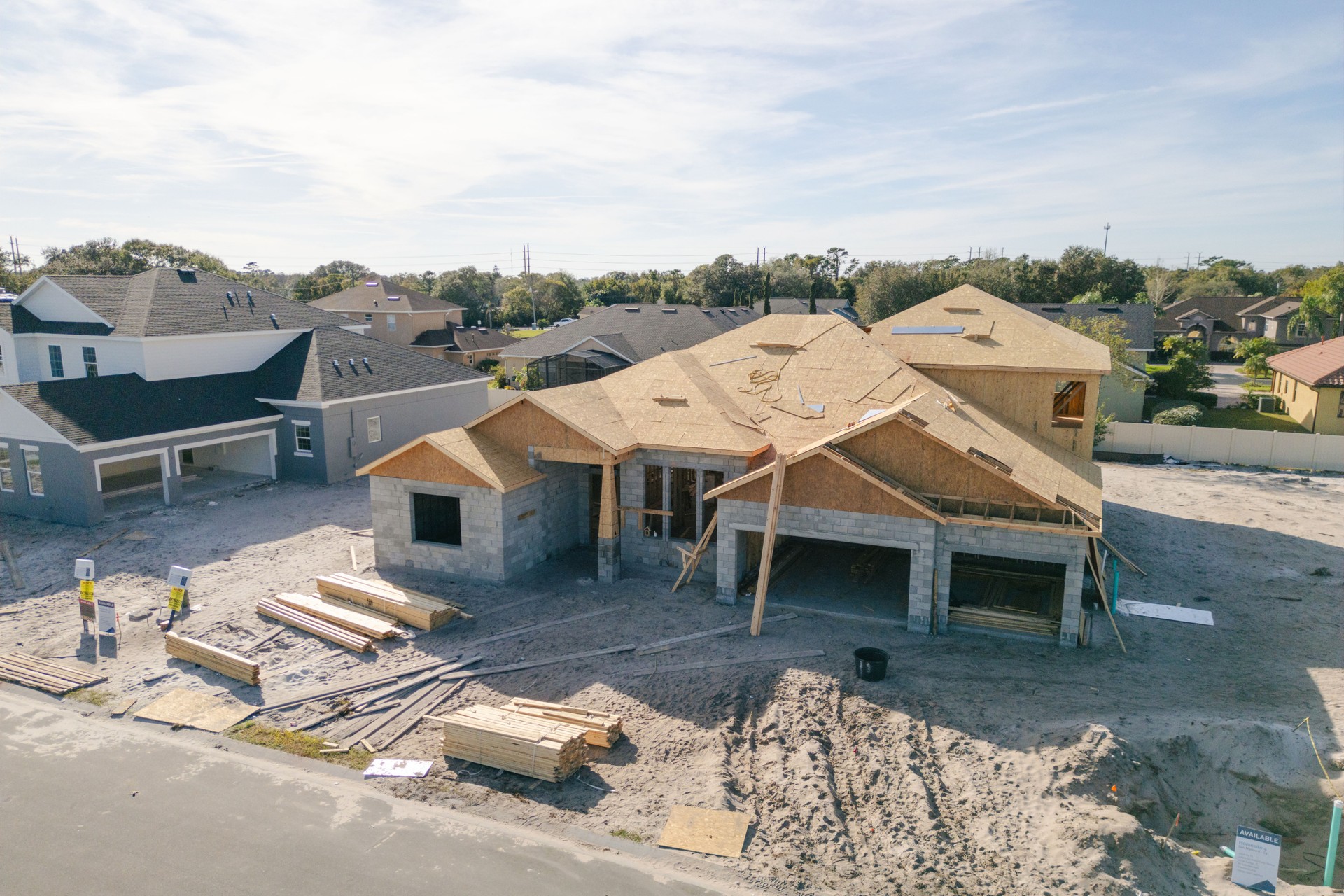 New Construction Home - Orlando Florida - Developing Neighborhood - House Under Construction - Roof Added